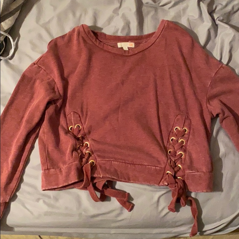 A purple sweater